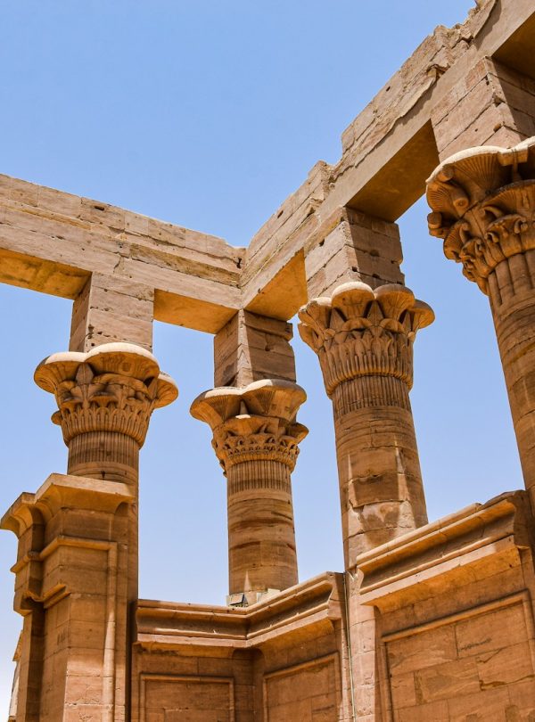 a group of stone pillars in a building